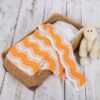 Haakpakket ripple baby deken oranje met ivoor van durable yarn