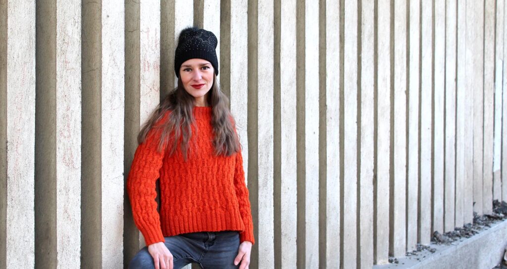 trui gemaakt met Cool wol in oranje rood
